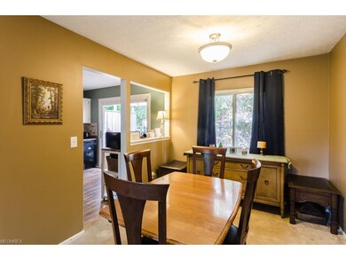 The formal dining room has a large opening to the 
