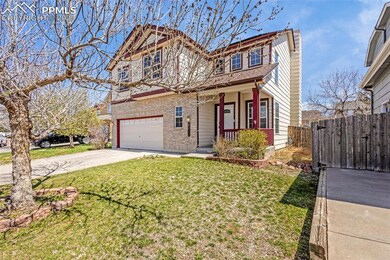 Traditional-style home featuring a porch, a front 