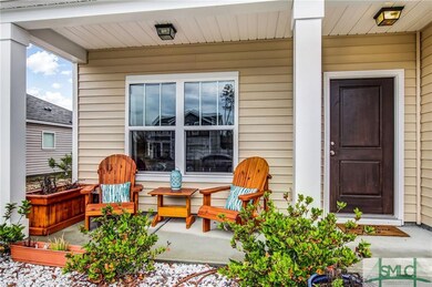 LOVELY FRONT PORCH WITH SITTING AREA