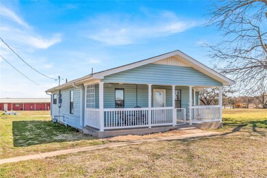 Bungalow-style house featuring a front lawn and co