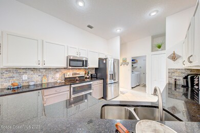 kitchen with vaulted ceiling