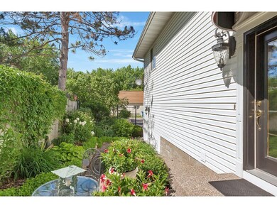 Gorgeous landscaped paver stone patio to enjoy a m
