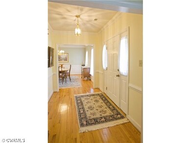 Foyer - Inviting foyer featuring hardwood flooring
