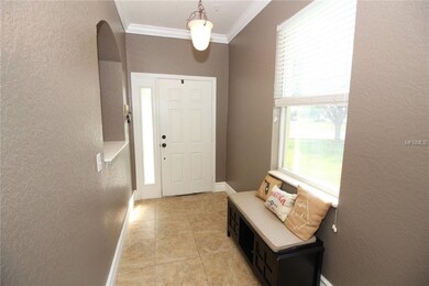 Inviting, Bright Foyer with Built In Shelf