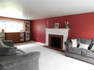 Large Living Room with lots of windows to bring in