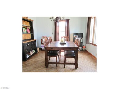 Dining area with beautiful, original hardwood floo