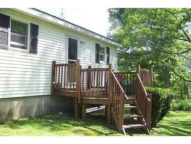 Exterior Back. Cozy deck off the...