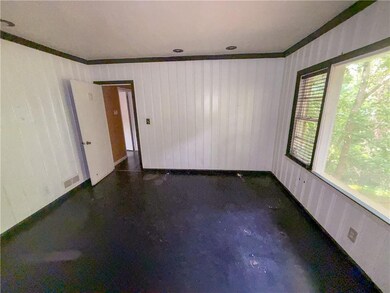 Spare room with crown molding and visible vents