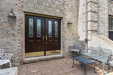 Wide Front Porch to Enjoy the Wooded Vistas