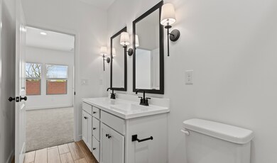 Primary bath with matte black finishes