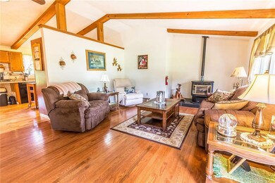 16x14 LIVING ROOM w/ Cathedral Ceiling and Pellet 