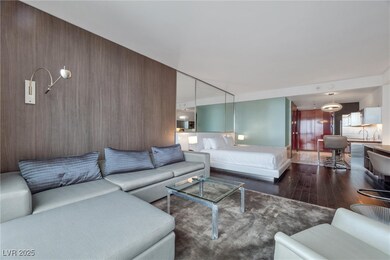 Living area with dark wood-style floors