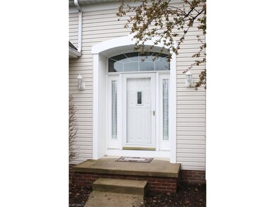 Simple elegance in this semi-arched entry!