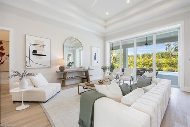 The open concept main living area features white o