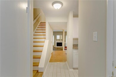 Freshly painted entry with Ceramic Tile Flooring.