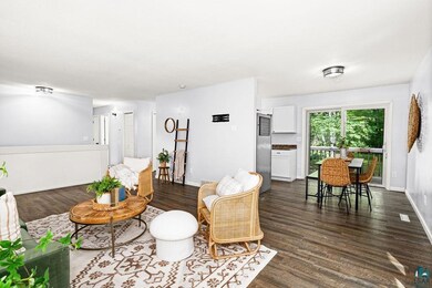 Living room with dark hardwood / wood-style floori