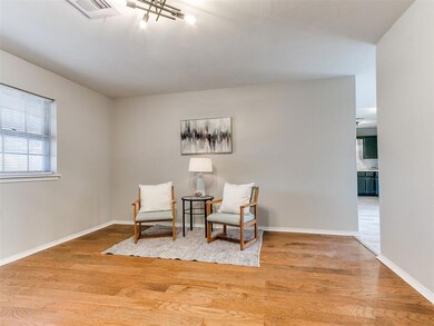 Sitting room featuring hardwood / wood-style floor