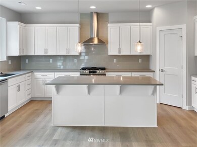 Pictures of another home with similar finishes. Some items may be optional.