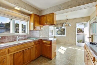 Kitchen, leading to breakfast area and small side 