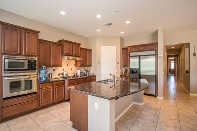 Dramatic Island Kitchen with Granite