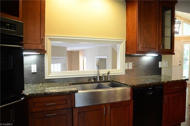 Apron Sink, Granite Counter Tops, Back Splash, Soft Close Cabinets. This Kitchen has all the bells & whistles!