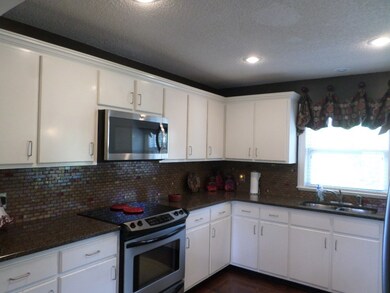 Granite Counter Tops and Stainless Appliances In K