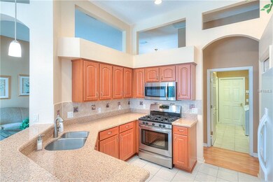 Stone counters, tile backsplash, updated cabinets 
