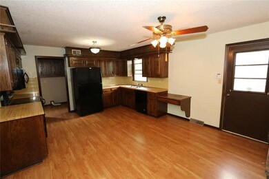 403 N Adams St, Raymore, MO 64083 - photo 7