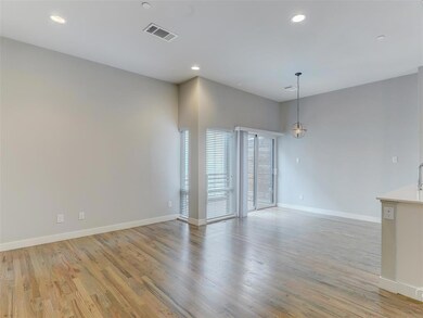 Living Room & Kitchen Dining Area