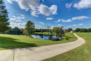 The beauty of the lake is first revealed from the paved driveway and enjoyed all the way to the house.  The lake is spring fed, previously stocked with fish, and is 12 to 13 feet deep.