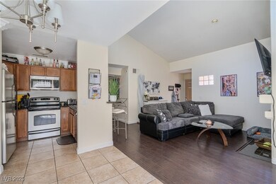 Living area with light wood-type flooring, visible