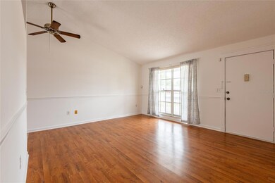 Light and bright great room with cathedral ceilings.
