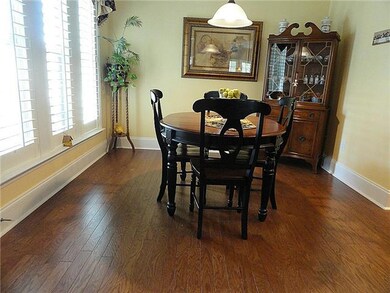 Huge nook area in kitchen.  High 7 in. Baseboards and Plantation Shutters throughout the home. (Upgrades)