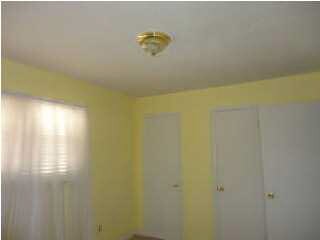 Bedroom #1 has 2 closets, door on right goes to ha