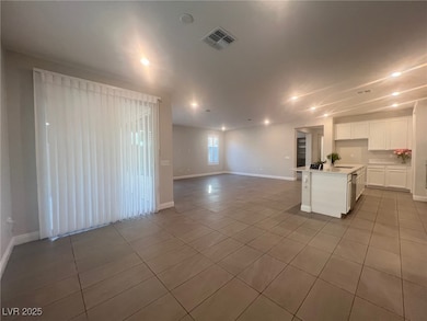 Kitchen featuring light tile patterned flooring, o