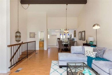 Vaulted ceiling great room with abundant light