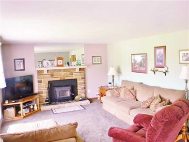Living Room. The large living room features a wood