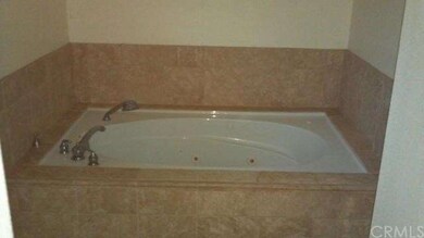 Jacuzzi Tub with Tile Surround.