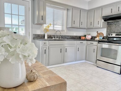 Kitchen view including coffee bar