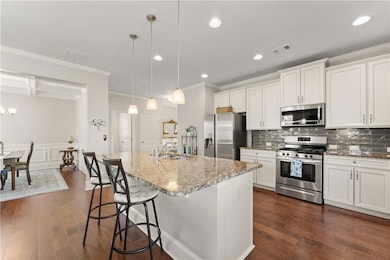 Kitchen with appliances with stainless steel finis