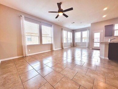 Unfurnished living room with a ceiling fan, reces