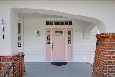Property entrance with a porch