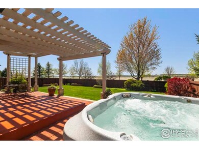 Enjoy the custom pergola and patio in addition to the  jacuzzi and the raised garden beds to the west of the yard.