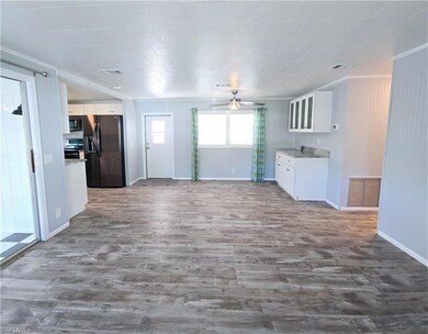 Living room looking towards dining room and side d
