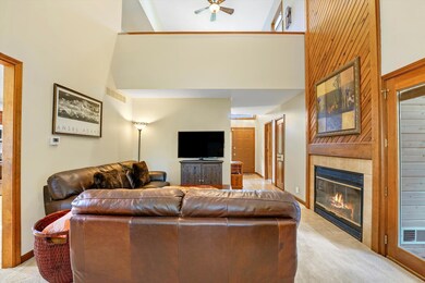 Open living room with gas log fireplace to enjoy d