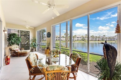 This long lanai view is from Breakfast nook w/ glass sliders to lanai.  Enclosed &  tiled, it’s perfect positioning for vast lake views all year long. Enclosures slide open to enjoy perfect SW Florida breezes and NE exposure provides for a light & bright condo all day.