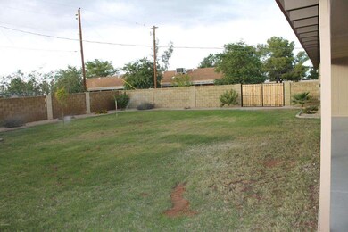 BLOCK FENCE & HUGE GRASSY YARD