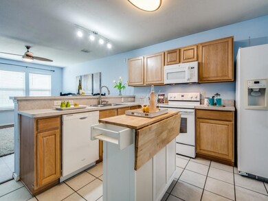 Kitchen with Movable Island, Built in Microwave.  