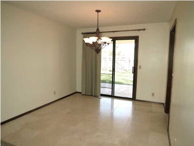 DINING AREA THAT LEADS OUT TO LOVELY COVERED PATIO