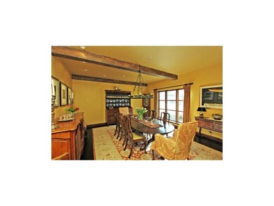 Dining Room with reclaimed walnut plank floors.